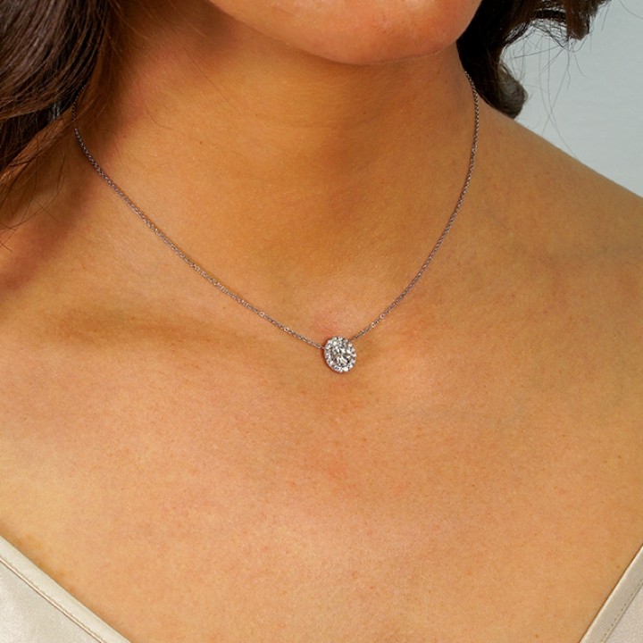 Moissanite and Diamond Oval Halo Pendant