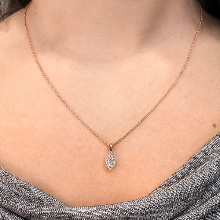 Image is with white BackgroundPetite Marquise Diamond Halo Pendant lifestyle