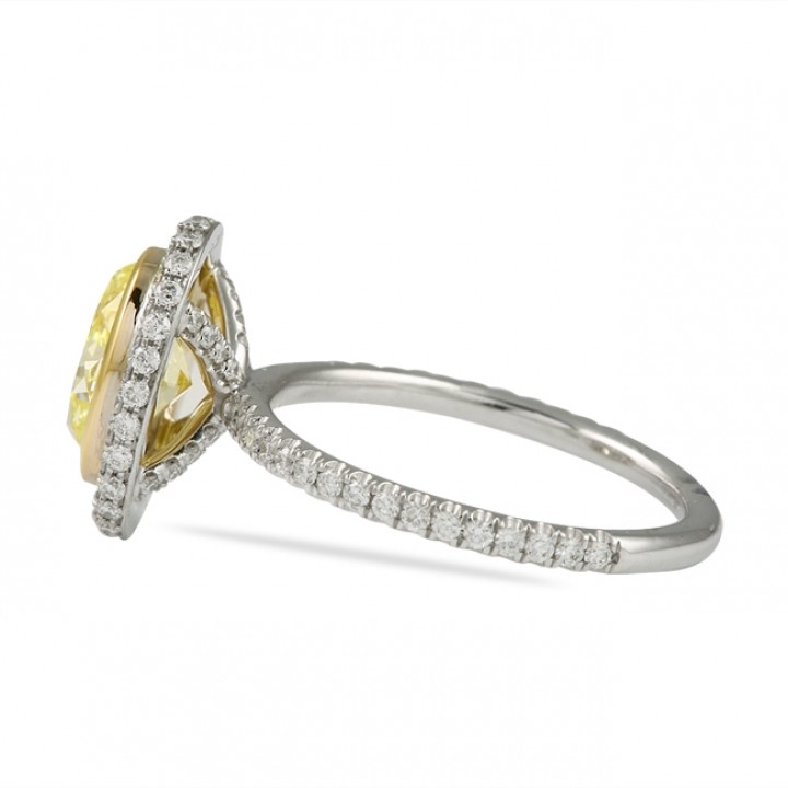 OVAL YELLOW DIAMOND ENGAGEMENT RING BEZEL SET