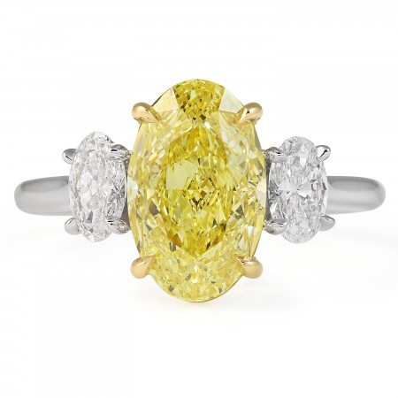 3.01 carat Fancy Intense Yellow Oval Diamond Three-Stone Ring flat