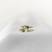 Oval Shaped Emerald and Diamond Open Ring lifestyle flatlay