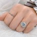 Cushion Cut Moissanite Three-Stone Engagement Ring lifestyle