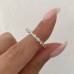 .80 carat Alternating Size Round Diamond Shared Prong Eternity Ring pointer