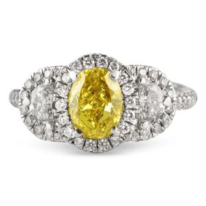 oval cut fancy yellow diamond three stone halo engagement ring white gold