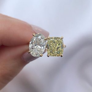 oval cut diamond and cushion fancy yellow diamond duo style ring yellow gold metal